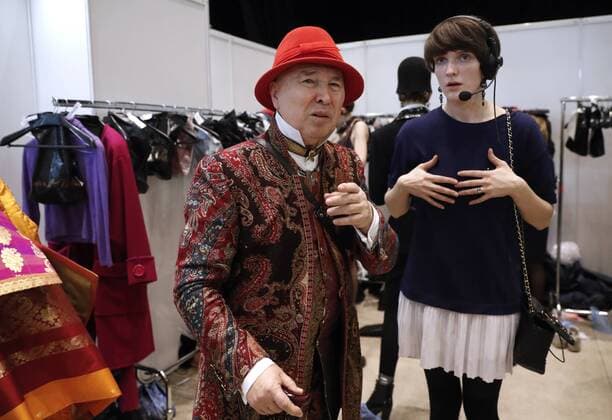 MOSCOW, RUSSIA - MARCH 12, 2017: Designer Slava Zaitsev (L) and a model backstage before a catwalk show for his spring summer 2017 collection by Slava Zaitsev at the 2017 Mercedes-Benz Fashion Week Russia in the Manege Central Exhibition Hall. Artyom Geodakyan TASS  TS043F7D