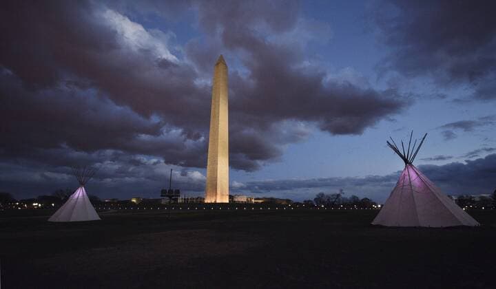 March 10, 2017 - Washington, DC, U.S - Teepees are lit up at night on the National Mall near Washington Monument. Dakota Access Pipeline protesters return to a teepee camp set up on the National Mall after Indigenous rights activists and many water protectors from Standing Rock held a rally at the Army Corps of Engineers then marched to the White House in Washington, D.C., on March 10, 2017. Washington U.S. - ZUMAg208 20170310_zap_g208_106 Copyright: xCarolxGuzyx