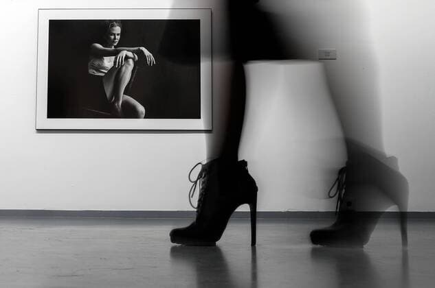 MOSCOW, RUSSIA - MARCH 16, 2017: A visitor by a photograph of actress Nicole Kidman taken for the 2017 Pirelli Calendar on display at an exhibition titled Pirelli Calendar 2017 by Peter Lindbergh at Moscow s Multimedia Art Museum. The exhibition is open from March 17 to May 14, 2017. Artyom Geodakyan TASS  TS0448A3