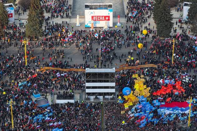 MOSCOW, RUSSIA - MARCH 18, 2017: An aerial view of people gathering for a concert marking the 3rd anniversary of Crimea s reunification with Russia, by the Moscow State University main building. Stanislav Krasilnikov TASS  TS044BEE