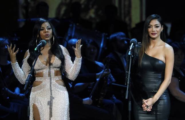 MOSCOW, RUSSIA - MARCH 18, 2017: American singers Ashanti (L) and Nicole Scherzinger at a ceremony to present BraVo international music awards at the Bolshoi Theatre. Mikhail Japaridze TASS  TS044C67