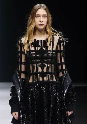MOSCOW, RUSSIA - MARCH 21, 2017: A model showcases creations during a runway show for the Fall Winter 2017 pret-a-porter collection by Russian fashion designer Valentin Yudashkin at the 37th Moscow Fashion Week at Moscow s Gostiny Dvor Shopping and Exhibition Centre. Stanislav Krasilnikov TASS  TS045056