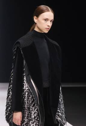 MOSCOW, RUSSIA - MARCH 21, 2017: A model showcases creations during a runway show for the Fall Winter 2017 pret-a-porter collection by Russian fashion designer Valentin Yudashkin at the 37th Moscow Fashion Week at Moscow s Gostiny Dvor Shopping and Exhibition Centre. Stanislav Krasilnikov TASS  TS04505D