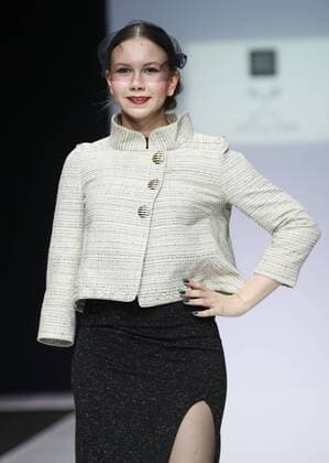 MOSCOW, RUSSIA - MARCH 23, 2017: A model showcases a creation during a catwalk show for the NP Open World collection at the Moscow Fashion Week, at the Gostiny Dvor Shopping and Exhibition Centre. Open World is a non-profit partnership helping integrate people with disabilities. Vyacheslav Prokofyev TASS  TS04534A