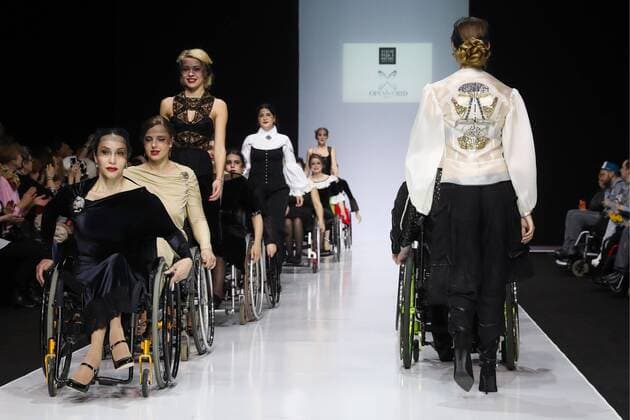 MOSCOW, RUSSIA - MARCH 23, 2017: Models showcase creations during a catwalk show for the NP Open World collection at the Moscow Fashion Week, at the Gostiny Dvor Shopping and Exhibition Centre. Open World is a non-profit partnership helping integrate people with disabilities. Vyacheslav Prokofyev TASS  TS045350