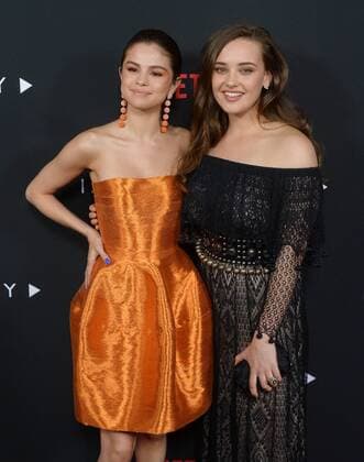Executive producer and actress Selena Gomez (L) and cast member Katherine Langford attend the premiere of Netflix s 13 Reasons Why on the Paramount Pictures Studios lot in Los Angeles on March 30, 2017. Storyline: Follows teenager Clay Jensen, in his quest to uncover the story behind his classmate and crush, Hannah, and her decision to end her life.  LAP2017033010 JIMxRUYMEN