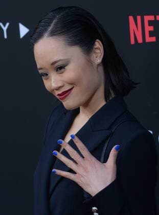 Cast member Michelle Ang attends the premiere of Netflix s 13 Reasons Why on the Paramount Pictures Studios lot in Los Angeles on March 30, 2017. Storyline: Follows teenager Clay Jensen, in his quest to uncover the story behind his classmate and crush, Hannah, and her decision to end her life.  LAP2017033043 JIMxRUYMEN