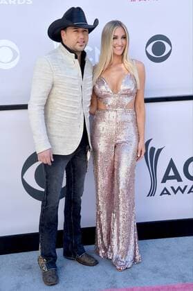 Recording artist Jason Aldean (L) and Brittany Kerr attend the 52nd annual Academy of Country Music Awards held at T-Mobile Arena in Las Vegas, Nevada on April 2, 2017. The show will be telecast live on CBS.  LVP20170402158 JIMxRUYMEN