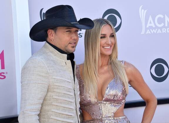 Recording artist Jason Aldean (L) and Brittany Kerr attend the 52nd annual Academy of Country Music Awards held at T-Mobile Arena in Las Vegas, Nevada on April 2, 2017. The show will be telecast live on CBS.  LVP20170402159 JIMxRUYMEN