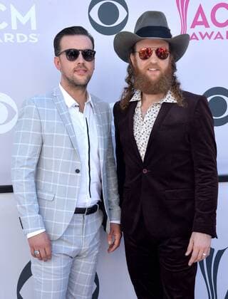 Recording artists T.J. Osborne (L) and John Osborne of music group Brothers Osborne attend the 52nd annual Academy of Country Music Awards held at T-Mobile Arena in Las Vegas, Nevada on April 2, 2017. The show will be telecast live on CBS.  LVP20170402178 JIMxRUYMEN
