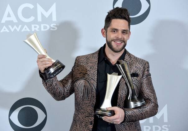 Recording artist Thomas Rhett , winner of the Male Vocalist of the Year and Song of the Year award appears backstage during the 52nd annual Academy of Country Music Awards held at T-Mobile Arena in Las Vegas, Nevada on April 2, 2017. The show will be telecast live on CBS.  LVP20170402247 JIMxRUYMEN