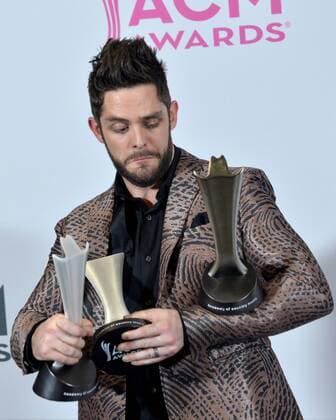 Recording artist Thomas Rhett , winner of the Male Vocalist of the Year and Song of the Year award appears backstage during the 52nd annual Academy of Country Music Awards held at T-Mobile Arena in Las Vegas, Nevada on April 2, 2017. The show will be telecast live on CBS.  LVP20170402250 JIMxRUYMEN
