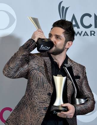 Recording artist Thomas Rhett , winner of the Male Vocalist of the Year and Song of the Year award appears backstage during the 52nd annual Academy of Country Music Awards held at T-Mobile Arena in Las Vegas, Nevada on April 2, 2017. The show will be telecast live on CBS.  LVP20170402245 JIMxRUYMEN