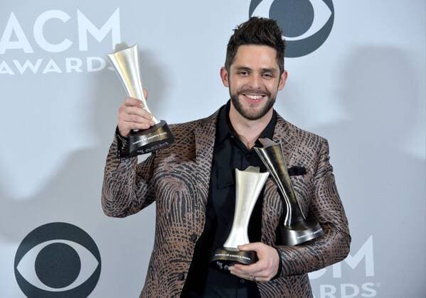 Recording artist Thomas Rhett , winner of the Male Vocalist of the Year and Song of the Year award appears backstage during the 52nd annual Academy of Country Music Awards held at T-Mobile Arena in Las Vegas, Nevada on April 2, 2017. The show will be telecast live on CBS.  LVP20170402246 JIMxRUYMEN