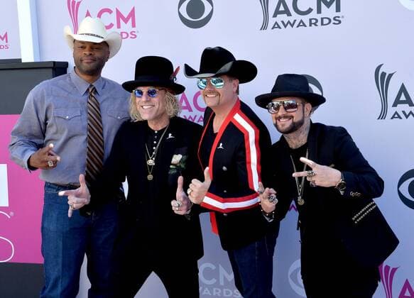 (L-R) Recording artists Cowboy Troy, Big Kenny and John Rich of music group Big & Rich, and DJ Sinister attend the 52nd annual Academy of Country Music Awards held at T-Mobile Arena in Las Vegas, Nevada on April 2, 2017. The show will be telecast live on CBS.  LVP20170402283 JIMxRUYMEN