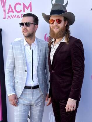 Recording artists T.J. Osborne (L) and John Osborne of music group Brothers Osborne attend the 52nd annual Academy of Country Music Awards held at T-Mobile Arena in Las Vegas, Nevada on April 2, 2017. The show will be telecast live on CBS.  LVP20170402300 JIMxRUYMEN