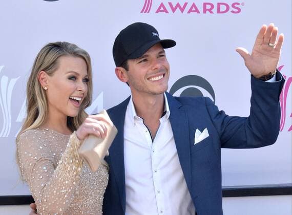 Actress Amber Bartlett (L) and singer-songwriter Granger Smith attend the 52nd annual Academy of Country Music Awards held at T-Mobile Arena in Las Vegas, Nevada on April 2, 2017. The show will be telecast live on CBS.  LVP20170402316 JIMxRUYMEN