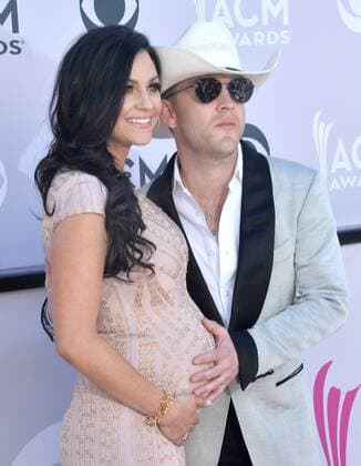 Singer Justin Moore (R) and Kate Moore attend the 52nd annual Academy of Country Music Awards held at T-Mobile Arena in Las Vegas, Nevada on April 2, 2017. The show will be telecast live on CBS.  LVP20170402321 JIMxRUYMEN