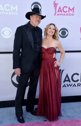 Singer Trace Adkins (L) and Victoria Pratt attend the 52nd annual Academy of Country Music Awards held at T-Mobile Arena in Las Vegas, Nevada on April 2, 2017. The show will be telecast live on CBS.  LVP20170402345 JIMxRUYMEN