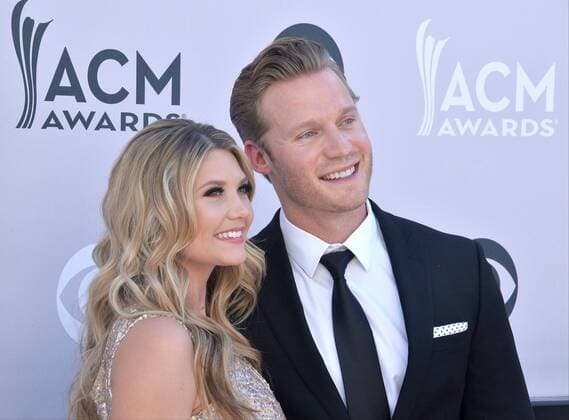 Radio personality Rob Stone (R) and guest attend the 52nd annual Academy of Country Music Awards held at T-Mobile Arena in Las Vegas, Nevada on April 2, 2017. The show will be telecast live on CBS.  LVP20170402384 JIMxRUYMEN