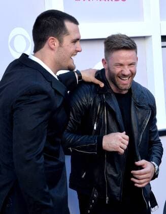 NFL players Derek Carr and Julian Edelman attend the 52nd annual Academy of Country Music Awards held at T-Mobile Arena in Las Vegas, Nevada on April 2, 2017. The show will be telecast live on CBS.  LVP20170402392 JIMxRUYMEN