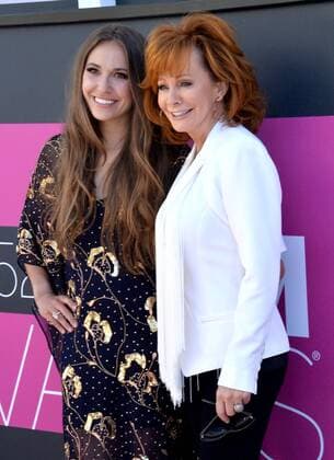 Recording artists Lauren Daigle (L) and Reba McEntire attend the 52nd annual Academy of Country Music Awards held at T-Mobile Arena in Las Vegas, Nevada on April 2, 2017. The show will be telecast live on CBS.  LVP20170402401 JIMxRUYMEN