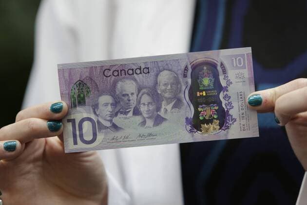 (170407) -- OTTAWA, April 7, 2017 -- A 10-Canadian-dollar banknote is pictured at the Bank of Canada in Ottawa, Canada, on April 7, 2017. The Bank of Canada on Friday unveiled a commemorative 10-Canadian-dollar banknote to mark the 150th anniversary of the country. ) CANADA-OTTAWA-COMMEMORATIVE BANKNOTE-UNVEILING DavidxKawai 