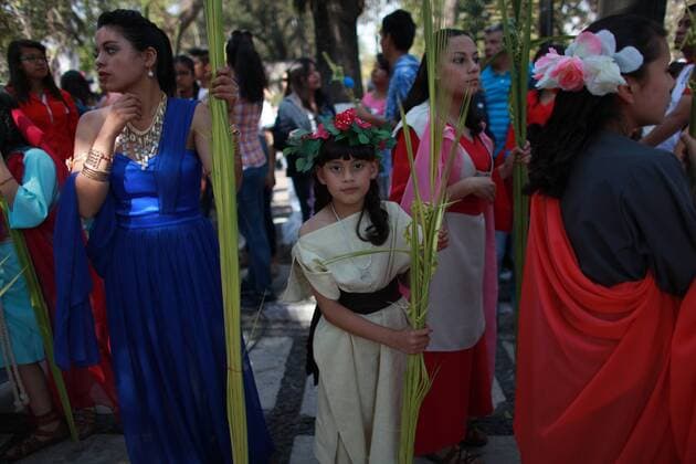 April 9, 2017 - Mexico City, Mexico - Roman Catholic devotes During Palm Sunday. Palm fronds are waved to be blessed by a priest to commemorate Palm Sunday which marks the beginning of Holy Week Sunday, April 9, 2017 at the San Lucas church Iztapalapa, Mexico. For Christians, Palm Sunday marks Jesus Christ s entrance into Jerusalem when his followers laid palm branches in his path, prior to his crucifixion. Mexico City Mexico  - ZUMAn230 20170409_zaa_n230_299 Copyright: xEmilioxEspejelx