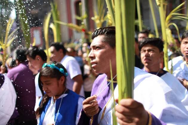 April 9, 2017 - Mexico City, Mexico - Roman Catholic devotes During Palm Sunday. Palm fronds are waved to be blessed by a priest to commemorate Palm Sunday which marks the beginning of Holy Week Sunday, April 9, 2017 at the San Lucas church Iztapalapa, Mexico. For Christians, Palm Sunday marks Jesus Christ s entrance into Jerusalem when his followers laid palm branches in his path, prior to his crucifixion. Mexico City Mexico  - ZUMAn230 20170409_zaa_n230_297 Copyright: xEmilioxEspejelx