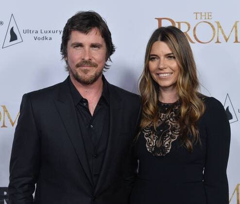 Cast member Christian Bale (L) and his wife Sibi Blazic attend the premiere of the motion picture historical drama The Promise at TCL Chinese Theatre in the Hollywood section of Los Angeles on April 12, 2017. Storyline: Set during the last days of the Ottoman Empire, The film follows a love triangle between Michael, a brilliant medical student, the beautiful and sophisticated Ana, and Chris - a renowned American journalist based in Paris.  LAP2017041201 JIMxRUYMEN