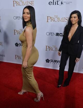 TV personalities Kim Kardashian West (L) and Kourtney Kardashian attend the premiere of the motion picture historical drama The Promise at TCL Chinese Theatre in the Hollywood section of Los Angeles on April 12, 2017. Storyline: Set during the last days of the Ottoman Empire, The film follows a love triangle between Michael, a brilliant medical student, the beautiful and sophisticated Ana, and Chris - a renowned American journalist based in Paris.  LAP2017041206 JIMxRUYMEN