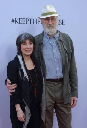 Cast member James Cromwell and his wife Anna Stuart attend the premiere of the motion picture historical drama The Promise at TCL Chinese Theatre in the Hollywood section of Los Angeles on April 12, 2017. Storyline: Set during the last days of the Ottoman Empire, The film follows a love triangle between Michael, a brilliant medical student, the beautiful and sophisticated Ana, and Chris - a renowned American journalist based in Paris.  LAP2017041217 JIMxRUYMEN