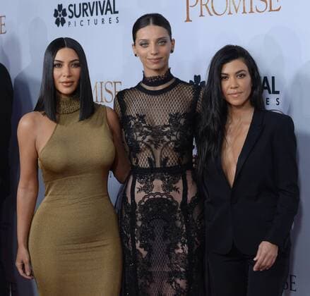 TV personalities Kim Kardashian West (L) and Kourtney Kardashian (R) and cast member Angela Sarafyan (C) attend the premiere of the motion picture historical drama The Promise at TCL Chinese Theatre in the Hollywood section of Los Angeles on April 12, 2017. Storyline: Set during the last days of the Ottoman Empire, The film follows a love triangle between Michael, a brilliant medical student, the beautiful and sophisticated Ana, and Chris - a renowned American journalist based in Paris.  LAP2017041219 JIMxRUYMEN