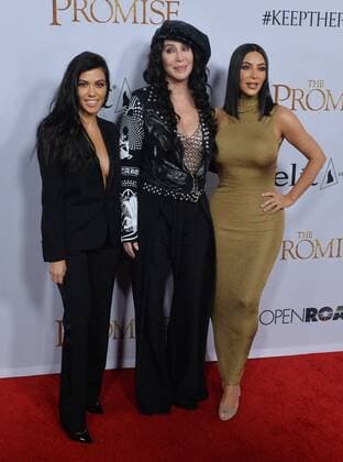 TV personalities Kourtney Kardashian (L) and Kim Kardashian West (R) and actress singer Cher attend the premiere of the motion picture historical drama The Promise at TCL Chinese Theatre in the Hollywood section of Los Angeles on April 12, 2017. Storyline: Set during the last days of the Ottoman Empire, The film follows a love triangle between Michael, a brilliant medical student, the beautiful and sophisticated Ana, and Chris - a renowned American journalist based in Paris.  LAP2017041230 JIMxRUYMEN