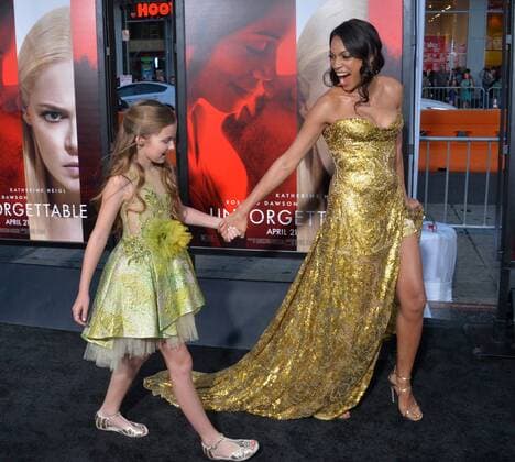 Cast members Isabella Kai Rice and Rosario Dawson attend the premiere of the motion picture dramatic thriller Unforgettable at TCL Chinese Theatre in the Hollywood section of Los Angeles on April 18, 2017. Storyline: A woman sets out to make life hell for her ex-husband s new wife.  LAP2017041815 JIMxRUYMEN