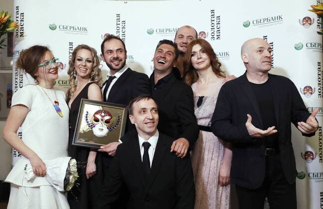 MOSCOW, RUSSIA - APRIL 19, 2017: Actors of the Krasnoyarsk TYuZ theatre pose with an award for Operetta Musical Best Production for The Drayman and the King at the 2017 Golden Mask award ceremony at the Stanislavsky and Nemirovich-Danchenko Moscow Music Theatre. Artyom Geodakyan TASS  TS048DCF