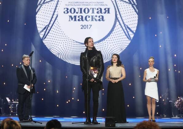 MOSCOW, RUSSIA - APRIL 19, 2017: Greek-Russian conductor Teodor Currentzis (C) accepts an award for Opera Best Conductor for La Traviata, Opera and Ballet Theatre, Perm, at the 2017 Golden Mask award ceremony at the Stanislavsky and Nemirovich-Danchenko Moscow Music Theatre. Valery Sharifulin TASS  TS048E02