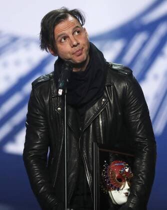 MOSCOW, RUSSIA - APRIL 19, 2017: Greek-Russian conductor Teodor Currentzis accepts an award for Opera Best Conductor for La Traviata, Opera and Ballet Theatre, Perm, at the 2017 Golden Mask award ceremony at the Stanislavsky and Nemirovich-Danchenko Moscow Music Theatre. Valery Sharifulin TASS  TS048E03