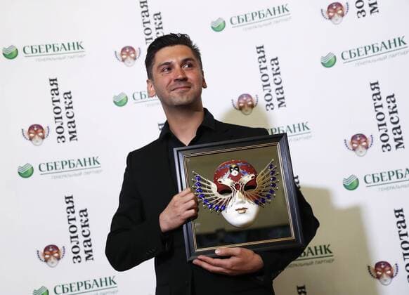 MOSCOW, RUSSIA - APRIL 19, 2017: Russian theatre director Roman Feodori poses with an award for Operetta-Musical Best Director for The Drayman and the King, TYuZ Theatre, Krasnoyarsk, at the 2017 Golden Mask award ceremony at the Stanislavsky and Nemirovich-Danchenko Moscow Music Theatre. Artyom Geodakyan TASS  TS048E16