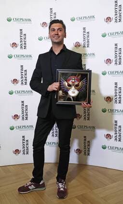 MOSCOW, RUSSIA - APRIL 19, 2017: Russian theatre director Roman Feodori poses with an award for Operetta-Musical Best Director for The Drayman and the King, TYuZ Theatre, Krasnoyarsk, at the 2017 Golden Mask award ceremony at the Stanislavsky and Nemirovich-Danchenko Moscow Music Theatre. Artyom Geodakyan TASS  TS048E17
