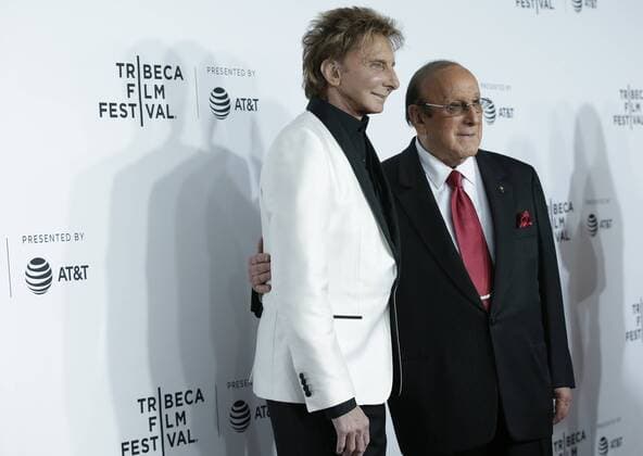 Clive Davis and Barry Manilow arrive on the red carpet at the Clive Davis: The Soundtrack Of Our Lives Premiere at Radio City Music Hall on April 19, 2017 in New York City.  NYP20170419154 JOHNxANGELILLO