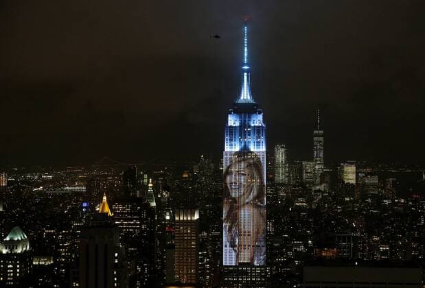 An artist rendering image of Jennifer Aniston is projected onto the Empire State Building in the Manhattan skyline to celebrate Harper Bazaar s 150th anniversary on April 19, 2017 in New York City. Spanning 42 floors of the building and rising 500 feet high, the show featured iconic fashion images of everyone from Audrey Hepburn to Kate Moss, including iconic works by the likes of Andy Warhol.  NYP20170419171 JOHNxANGELILLO