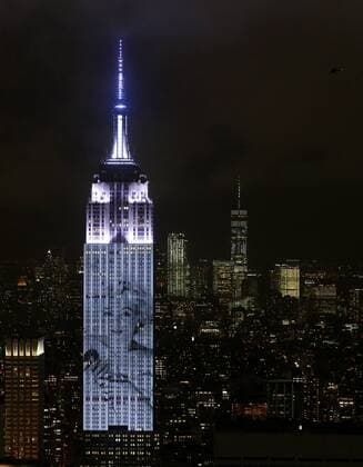 An artist rendering image of Marilyn Monroe is projected onto the Empire State Building in the Manhattan skyline to celebrate Harper Bazaar s 150th anniversary on April 19, 2017 in New York City. Spanning 42 floors of the building and rising 500 feet high, the show featured iconic fashion images of everyone from Audrey Hepburn to Kate Moss, including iconic works by the likes of Andy Warhol.  NYP20170419298 JOHNxANGELILLO
