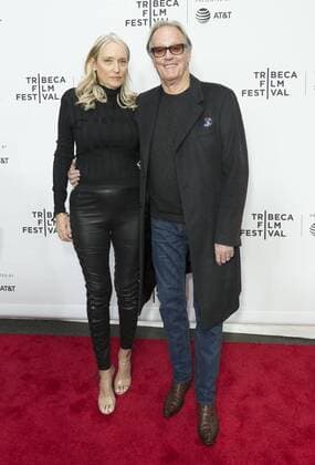 US: 2017 Tribeca film festival opening night Margaret DeVogelaere, Peter Fonda attend movie Clive Davis: The Soundtrack Of Our Lives Premiere at Radio City Music Hall during Tribeca Film Festival opening night  LevxRadin