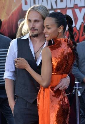 Cast member Zoe Saldana and her husband Marco Perego attend the premiere of the sci-fi motion picture Guardians of the Galaxy Vol. 2 at the Dolby Theatre in the Hollywood section of Los Angeles on April 19, 2017. Storyline: Set to the backdrop of Awesome Mixtape 2, Guardians continues the team s adventures as they unravel the mystery of Peter Quill s true parentage.  LAP2017041910 JIMxRUYMEN