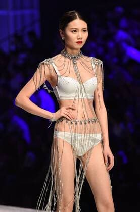 April 19, 2017 - Shenzhen, Shenzhen, China - Shenzhen, CHINA-April 19 2017: (EDITORIAL USE ONLY. CHINA OUT) A model presents one piece of Oleno creation during the 2017 China (Shenzhen) International Brand Underwear Fair in south China s Shenzhen, April 19th, 2017. Shenzhen China  - ZUMAs145 20170419_zaa_s145_205 Copyright: xOuxJinweix