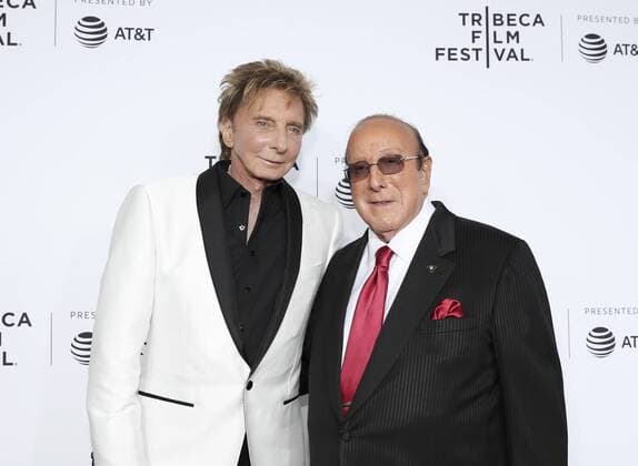 (170420) -- NEW YORK, April 20, 2017 -- Singer Barry Manilow (L) and music mogul Clive Davis attend the opening night of the 2017 Tribeca Film Festival and the world premiere of Clive Davis: The Soundtrack of Our Lives in New York, the United States, April 19, 2017. The 16th annual Tribeca Film Festival opened here Wednesday night, bringing a trove of films, TV events, virtual reality installations and music pieces to New York. ) (djj) U.S.-NEW YORK-TRIBECA FILM FESTIVAL-OPEN WangxYing 