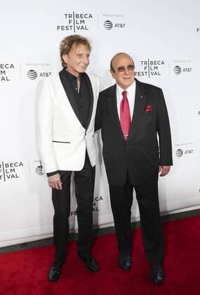 (170420) -- NEW YORK, April 20, 2017 -- Singer Barry Manilow (L) and music mogul Clive Davis attend the opening night of the 2017 Tribeca Film Festival and the world premiere of Clive Davis: The Soundtrack of Our Lives in New York, the United States, April 19, 2017. The 16th annual Tribeca Film Festival opened here Wednesday night, bringing a trove of films, TV events, virtual reality installations and music pieces to New York. ) (djj) U.S.-NEW YORK-TRIBECA FILM FESTIVAL-OPEN WangxYing 