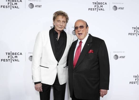 (170420) -- NEW YORK, April 20, 2017 -- Singer Barry Manilow (L) and music mogul Clive Davis attend the opening night of the 2017 Tribeca Film Festival and the world premiere of Clive Davis: The Soundtrack of Our Lives in New York, the United States, April 19, 2017. The 16th annual Tribeca Film Festival opened here Wednesday night, bringing a trove of films, TV events, virtual reality installations and music pieces to New York. ) (djj) U.S.-NEW YORK-TRIBECA FILM FESTIVAL-OPEN WangxYing 