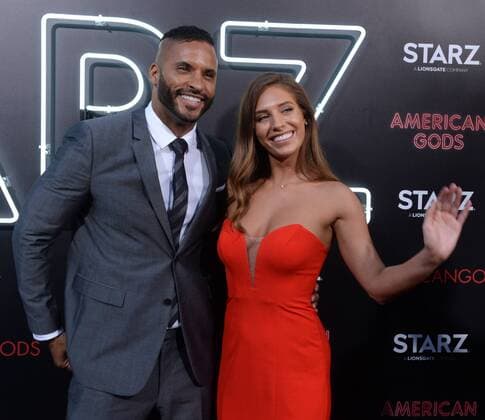Cast member Ricky Whittle and Kristina Colonna attend the premiers of Starz s new television series American Gods at the ArcLight Cinema Dome in the Hollywood section of Los Angeles on April 20, 2017. Storyline: A recently released ex-convict named Shadow meets a mysterious man who calls himself Wednesday and who knows more than he first seems to about Shadow s life and past.  LAP2017042025 JIMxRUYMEN
